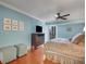 Main bedroom with hardwood floors and water view at 800 S Gulfview Blvd # 101, Clearwater Beach, FL 33767