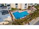 Community pool with ample lounge chairs at 800 S Gulfview Blvd # 101, Clearwater Beach, FL 33767