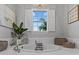 Relaxing bathroom with a large soaking tub and window view at 821 Forest Glen Ct, Palm Harbor, FL 34683