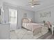 Bright bedroom with a single bed and a desk at 821 Forest Glen Ct, Palm Harbor, FL 34683