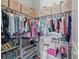 Well-organized closet with ample hanging space and shelving at 821 Forest Glen Ct, Palm Harbor, FL 34683