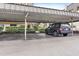 Covered carport parking with one vehicle shown at 8703 Bardmoor Blvd # 106, Seminole, FL 33777