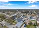 Aerial view of a house with a neighborhood in the background at 9100 52Nd N Way, Pinellas Park, FL 33782