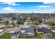 Aerial view showcasing the house and surrounding neighborhood at 9100 52Nd N Way, Pinellas Park, FL 33782