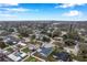 Aerial view of a home in a residential neighborhood at 9100 52Nd N Way, Pinellas Park, FL 33782