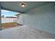 Covered patio overlooking a fenced-in backyard at 9100 52Nd N Way, Pinellas Park, FL 33782