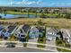 Aerial view of houses and neighborhood with water views at 935 Signet Dr, Apollo Beach, FL 33572