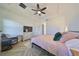 Bright bedroom with king-size bed and an ensuite bathroom at 935 Signet Dr, Apollo Beach, FL 33572