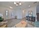 Bright entryway with herringbone floors and a view of the stairs at 935 Signet Dr, Apollo Beach, FL 33572