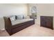 Bedroom with daybed and nightstand at 9551 Jaybird Ln, Land O Lakes, FL 34638