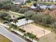 Aerial view of community park with basketball court and playground at 9551 Jaybird Ln, Land O Lakes, FL 34638