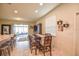 Kitchen dining area with table and chairs, view of sliding doors to backyard at 4762 White Sanderling Ct, Tampa, FL 33619