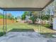 Covered patio overlooking a grassy backyard at 10463 118Th Ave, Largo, FL 33773