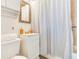 Small bathroom with white vanity and shower/tub combo at 10463 118Th Ave, Largo, FL 33773