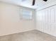 Bedroom with double door closet and ceiling fan at 10463 118Th Ave, Largo, FL 33773