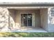 Covered back patio with sliding glass doors at 10721 Rockledge View Dr, Riverview, FL 33579