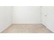 Empty bedroom with carpeted floors and door at 10721 Rockledge View Dr, Riverview, FL 33579