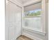 Well-lit bedroom with a large window and closet at 111 W Ida St, Tampa, FL 33603