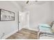 Bright bedroom with a daybed and access to a hallway at 111 W Ida St, Tampa, FL 33603