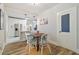 Bright dining area with four chairs and view of the kitchen at 111 W Ida St, Tampa, FL 33603