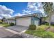 Spacious two-car garage with a clean concrete driveway at 11308 Great Neck Rd, Riverview, FL 33578