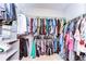 Spacious walk-in closet with ample hanging space and shelving for optimal storage at 11308 Great Neck Rd, Riverview, FL 33578