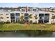 Aerial view of condo building with water access at 11485 Oakhurst Dr # 1100-312, Largo, FL 33774