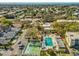 Aerial view showing pool, shuffleboard, and location at 11485 Oakhurst Dr # 1100-312, Largo, FL 33774