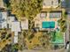 Aerial view showing pool, shuffleboard, and community buildings at 11485 Oakhurst Dr # 1100-312, Largo, FL 33774