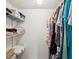 Spacious closet with shelving and hanging rods at 11485 Oakhurst Dr # 1100-312, Largo, FL 33774