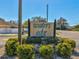 Waters Edge community entrance sign with landscaping at 11485 Oakhurst Dr # 1100-312, Largo, FL 33774