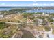 Aerial view showing home's location near the water at 1243 Bayshore Dr, Terra Ceia, FL 34250