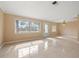 Open living space with tile flooring and natural light at 1243 Bayshore Dr, Terra Ceia, FL 34250