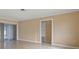 Spacious living area with tile floors and sliding doors at 1243 Bayshore Dr, Terra Ceia, FL 34250