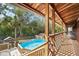 Elevated view of backyard pool and surrounding deck at 13345 14Th St, Dade City, FL 33525