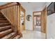 Wooden staircase with patterned carpet runner at 13345 14Th St, Dade City, FL 33525