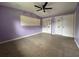 Bright bedroom with ceiling fan and closet at 1373 Fairfax Rd, Clearwater, FL 33764