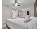 Bright bedroom with a queen-size bed and mirrored closet doors at 1753 Lucas Dr, Clearwater, FL 33759