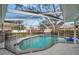 Large screened-in pool and patio area at 1753 Lucas Dr, Clearwater, FL 33759