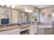 Elegant bathroom with double vanity and soaking tub at 1920 Longliner Loop, Wesley Chapel, FL 33543