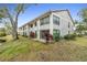 Rear view of condo building near water at 2188 Elm St # 1107, Dunedin, FL 34698