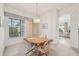 Bright dining area with view into kitchen at 2234 Preservation Green Ct, Sun City Center, FL 33573