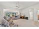 Bright living room with view of backyard at 2234 Preservation Green Ct, Sun City Center, FL 33573