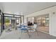 Relaxing screened porch with seating and view at 2234 Preservation Green Ct, Sun City Center, FL 33573