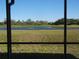 Peaceful water view from window; serene landscape at 2234 Preservation Green Ct, Sun City Center, FL 33573