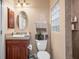 Bathroom includes a toilet, sink, and a large walk-in shower at 2262 Sagebloom Ter, North Port, FL 34286