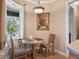 Charming kitchen nook with rustic table and chairs, perfect for casual meals at 2262 Sagebloom Ter, North Port, FL 34286