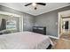 Spacious bedroom with a king-size bed and a view of the kitchen at 2522 Krueger Ln, Tampa, FL 33618