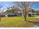 House exterior showcasing a modern color scheme and landscaping at 2522 Krueger Ln, Tampa, FL 33618