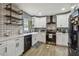 Newly renovated kitchen featuring white shaker cabinets and stainless steel appliances at 2522 Krueger Ln, Tampa, FL 33618